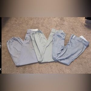 Boys size adult medium baseball pants 3 grey pairs.